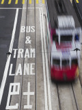 Tram Passing Along Des Voeux Road Central, Central, Hong Kong, China