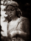 A Female Statue in Cemetery