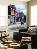 Buy Brightly Coloured Buildings and Motorcycle Taxi at AllPosters.com