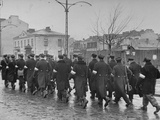 Polish Armed Guards Walking in Line Through Street