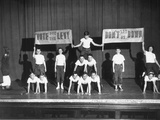 Children at Benton Elementry School Dramatizing their Flight with Human Pyramids