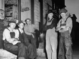 Group of Farmers Standing Outside Store