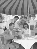 Golfer Ben Hogan Eating at an Outside Restaurant