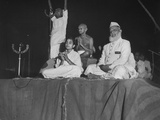 Buy Hindu Leader Mohandas Gandhi with Others Participating in Twilight Prayer at AllPosters.com