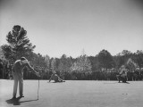 Golfer Byron Nelson Watching His Putt During a Golf Tournament