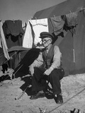 A Picture Frame Maker from Sofia-Bulgaria, Sitting Outside of His Quarters