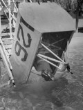 Pilots and Guests Playing in a Pool at a Take-Off Party