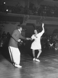 Couple Dancing in a Jitterbug Contest