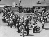 Workers Lining Up to Get Meals and Haircuts and to Serve as Taxi Drivers