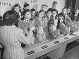 How Babies are Born Is Explained by Cutaway Models to School Children at the Dallas Health Museum