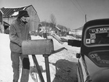 85 Year-Old Elmer Bull Out to Meet Rural Mailman Mark Whalon Making Rounds in Sub-Zero Weather