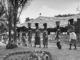 Local Women Transporting Buckets by their Heads During the Mkaing of the Movie 