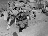 German Women Pulling Wagons Loaded with Material Taken from an Abandoned Nazi Freight Train