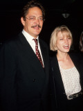 Actors Raul Julia and Bridget Fonda