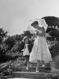 Actress Zsa Zsa Gabor with Her Daughter, Walking Out Side their Bel Air Home