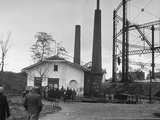 Voters Standing Outside at Polls Near Gasworks