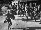 Local Members Dancing a Tribal Dance for the Outsiders before the Gorilla Hunting Begins