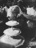 Carolyn House Cutting Tbirthday Cake for US Swimmers at Olympics