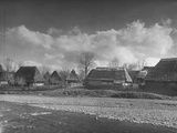 Quaint Huts with Grass-Thatched Roofs in the Ruthenia Section of the Country Near the Polish Border