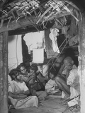 Indian Family of the Untouchables Caste, on River Boat Where They Live