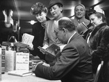 Author Eric Hodgins as He Signs Copies of His Book "Mr. Blandings Builds His Dream House"
