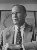 Director of Sesp Dr. George Saunders, Holding a Cigarette