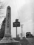 Maryland Mason and Dixon Line Monument Pillar Next to Maryland State Line-Baltimore 50Mi. Sign