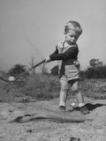 Two Year Old Golfer Bobby Mallick Taking a Swing