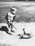 Two Year Old Golfer Bobby Mallick Trying to Get Out of the Sand Trap