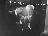 Conductor Arturo Toscanini Checking a Watch with His Grandson