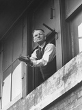 Signalman Nick Carter Giving "Flat Wheels" Signal to Oncoming Train from His Tower Station