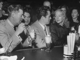 Sidney Skolsky, Larry Parks and Evelyn Keyes Sitting at the Bar During the Drugstore Party