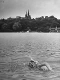 Mary Freeman Swimming Against Current to Build Endurance During Training