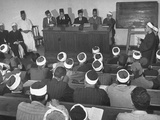 The Faculty of Theology Meeting to Hear a Student Read His Thesis
