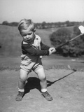 Two Year Old Golfer Bobby Mallick Taking a Swing