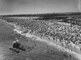 NYC Police Helicopter Hovering over Independence Day Crowd at Beach at Riis Park