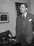 G. Mason Owlett, Standing Near the Republian Elephant While Talking Seriously