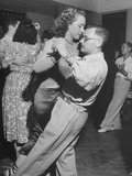 Couples Jitterbug Dancing at Local Club