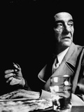 French Painter Maurice Utrillo Seated and Holding Cigarette