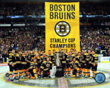 The Boston Bruins raise their 2011 Stanley Cup Chapionship Banner