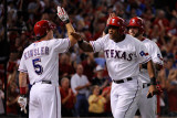 Detroit Tigers v Rangers - Arlington, TX - Oct. 15: Adrian Beltre, Mike Napoli and Ian Kinsler