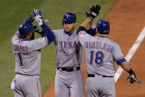 Rangers v Cardinals, St Louis, MO - Oct. 27: Elvis Andrus, Josh Hamilton and Mitch Moreland