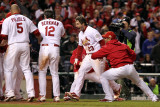 Rangers v Cardinals, St Louis, MO - Oct. 27: David Freese, Albert Pujols and Lance Berkman