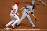 Rangers v Cardinals, St Louis, MO - Oct. 27: Lance Berkman, Colby Lewis and Michael Young