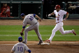 Rangers v Cardinals, St Louis, MO - Oct. 27: Lance Berkman, Colby Lewis and Michael Young