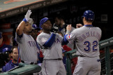 Rangers v Cardinals, St Louis, MO - Oct. 27: Josh Hamilton, Esteban German and Yorvit Torrealba