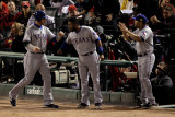 Rangers v Cardinals, St Louis, MO - Oct. 28: Josh Hamilton, Elvis Andrus and Yorvit Torrealba