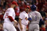 Rangers v Cardinals, St Louis, MO - Oct. 28: Albert Pujols, Elvis Andrus and Chris Carpenter