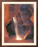 Sunbeam Illuminates Sandy Floor and Sandstone Walls of a Slot Canyon, Antelope Canyon, Page