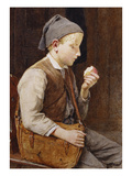 A Boy Eating an Apple